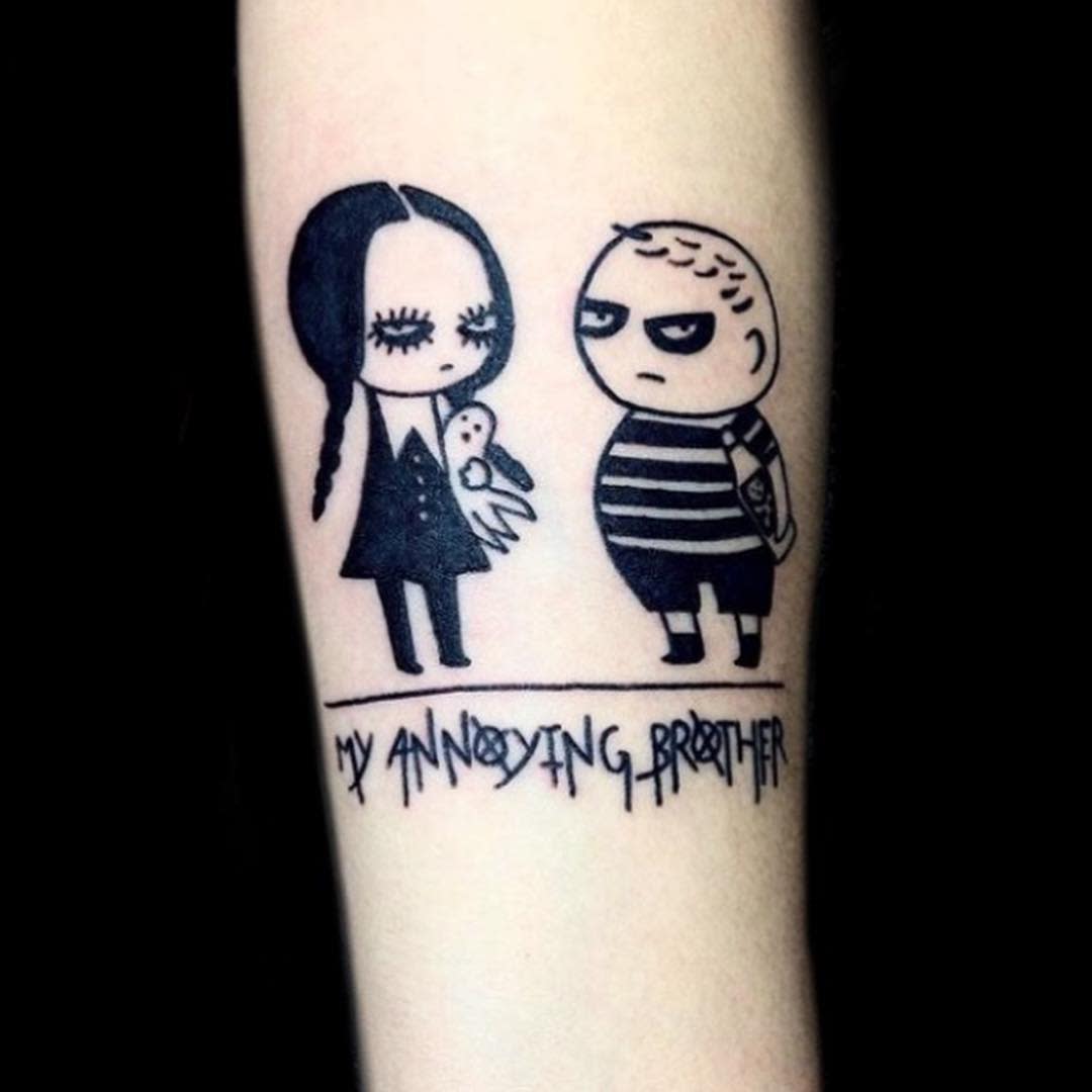 Tattoo of Wednesday Addams and Pugsley; text reads "MY ANNOYING BROTHER"